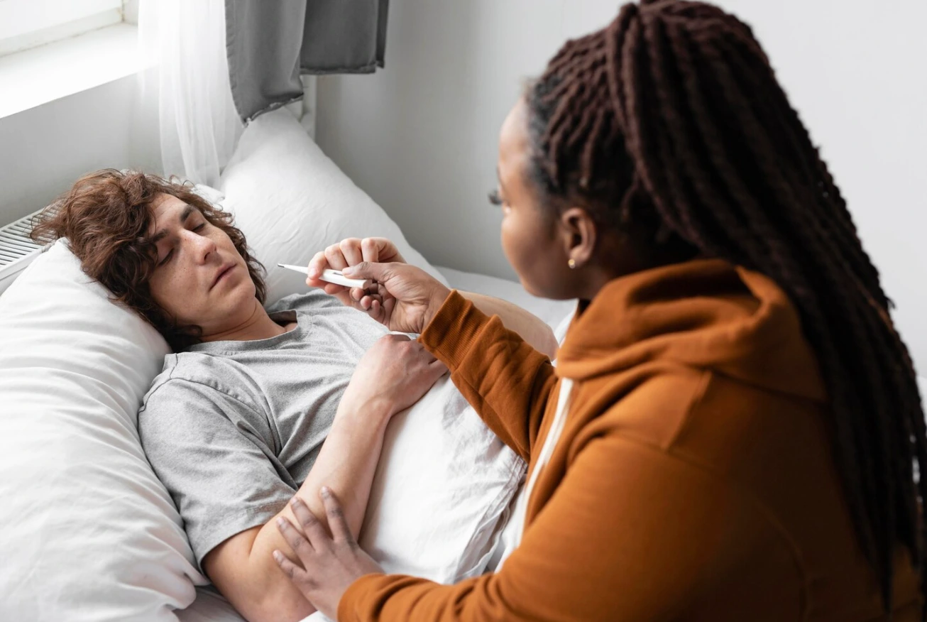 A woman taking care of her ill friend.
