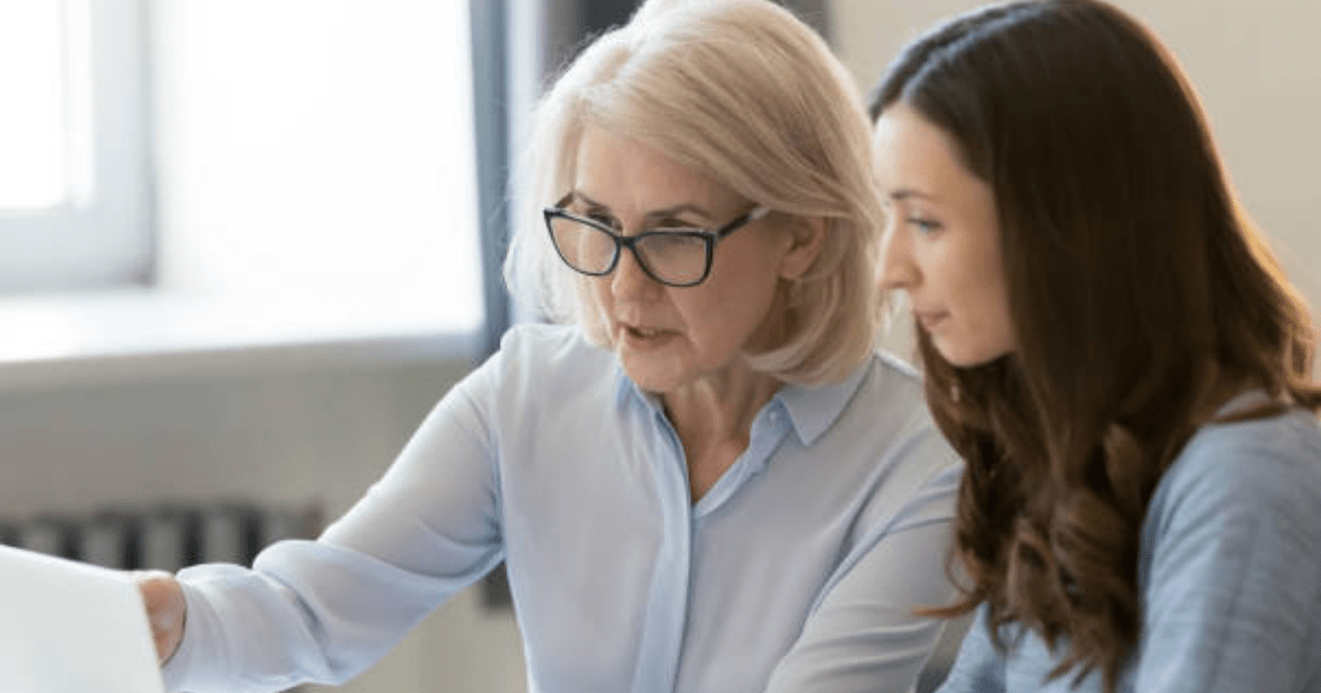 A pair of women having a serious, thoughtful conversation.