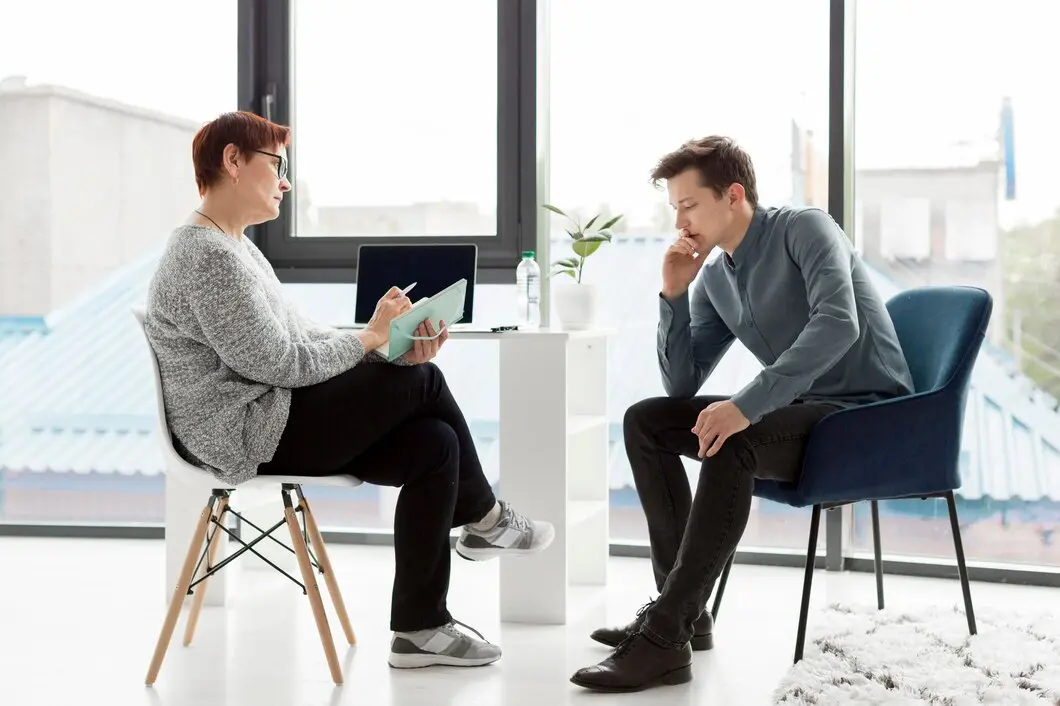 A man speaking with his therapist in Riverside.